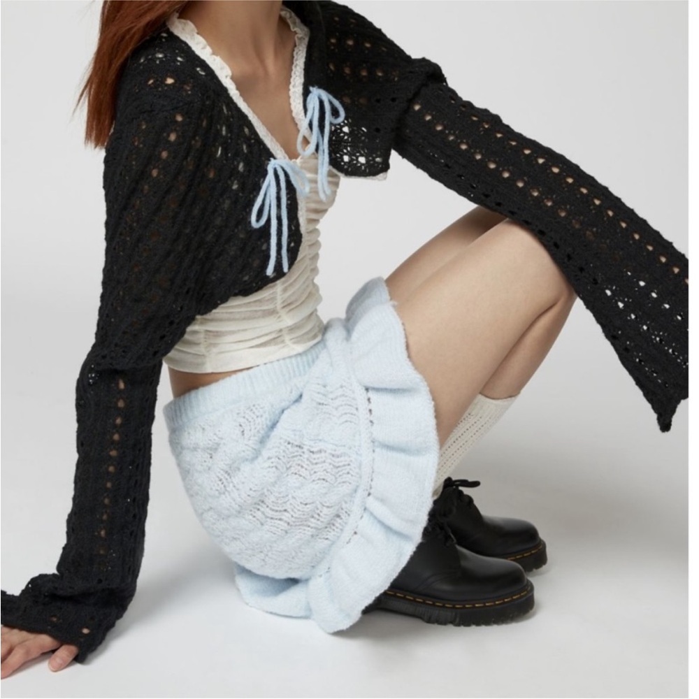 Crochet shrug with lace trim